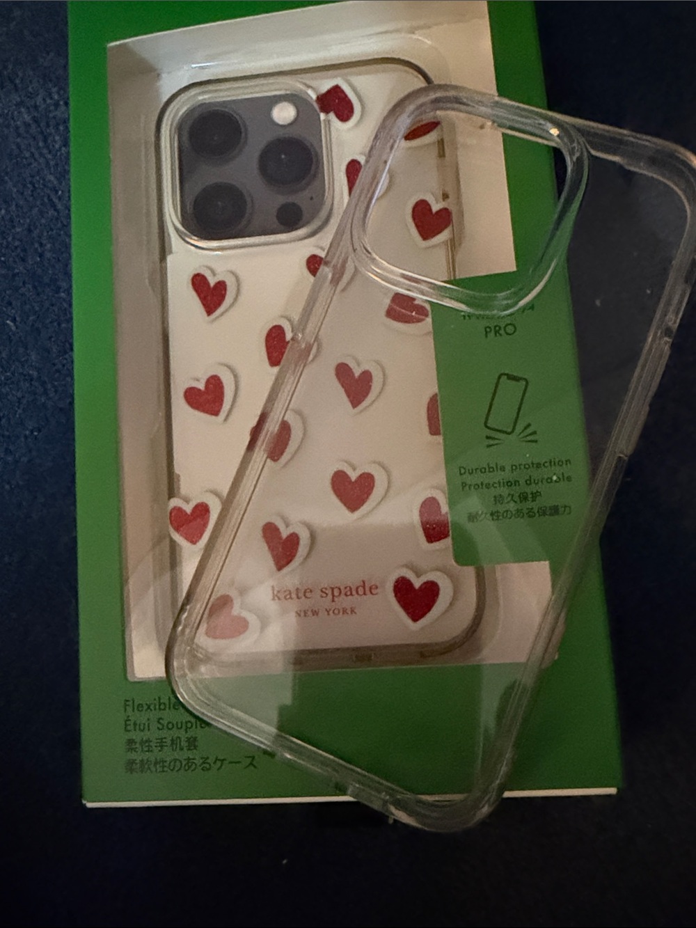 2-14pro CASES 1-NWT HEARTS & 1 GENTLY USED NO CRACKS OR BROKEN PIECES.
